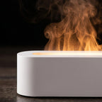 Close-up of the diffuser's slot showing the flame effect is fine ultrasonic water mist lit from below, not fire