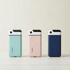The phone lock box in its three colours side by side: mint, blush pink and navy blue