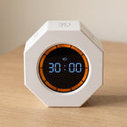 Close overhead view of the timer turned onto its 30 minute facet, the display reading 30:00
