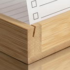 Close-up of the bamboo wood grain, mitered joint, and printed checkbox card on the to-do card holder